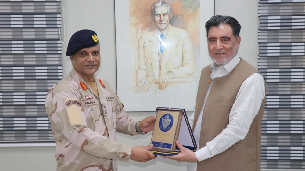 The Vice Chancellor Prof. Dr. Muhammad Naeem Qazi is presenting souvenir  to visiting Regional Director Khyber Pakhtunkhwa Anti Narcotics Force  Brigadier Mazhar Hussain after meeting at the Vice Chancellor office.