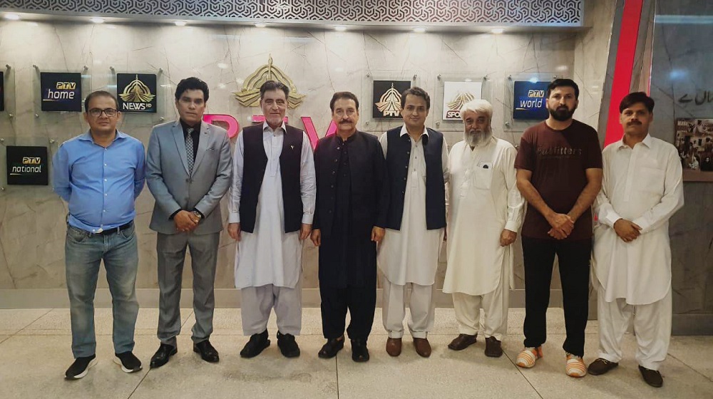 The Vice Chancellor Prof. Dr. Muhammad Naeem Qazi is standing along with the General Manager  Pakistan Television Centre Mr.Ibrahim Kamal and production crew after participating in the 